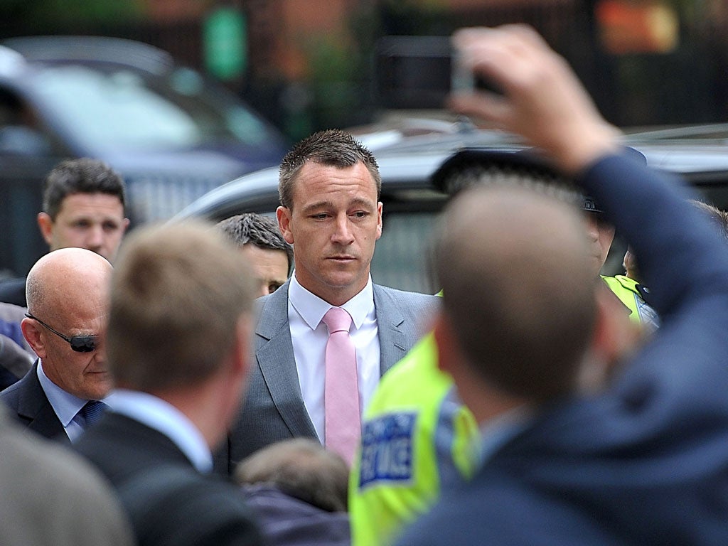 John Terry arrives at court for his race trial